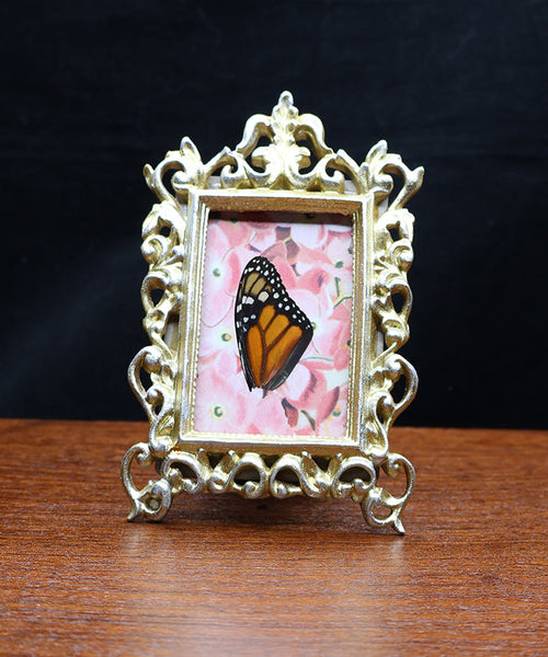 Radiant Monarch Charm